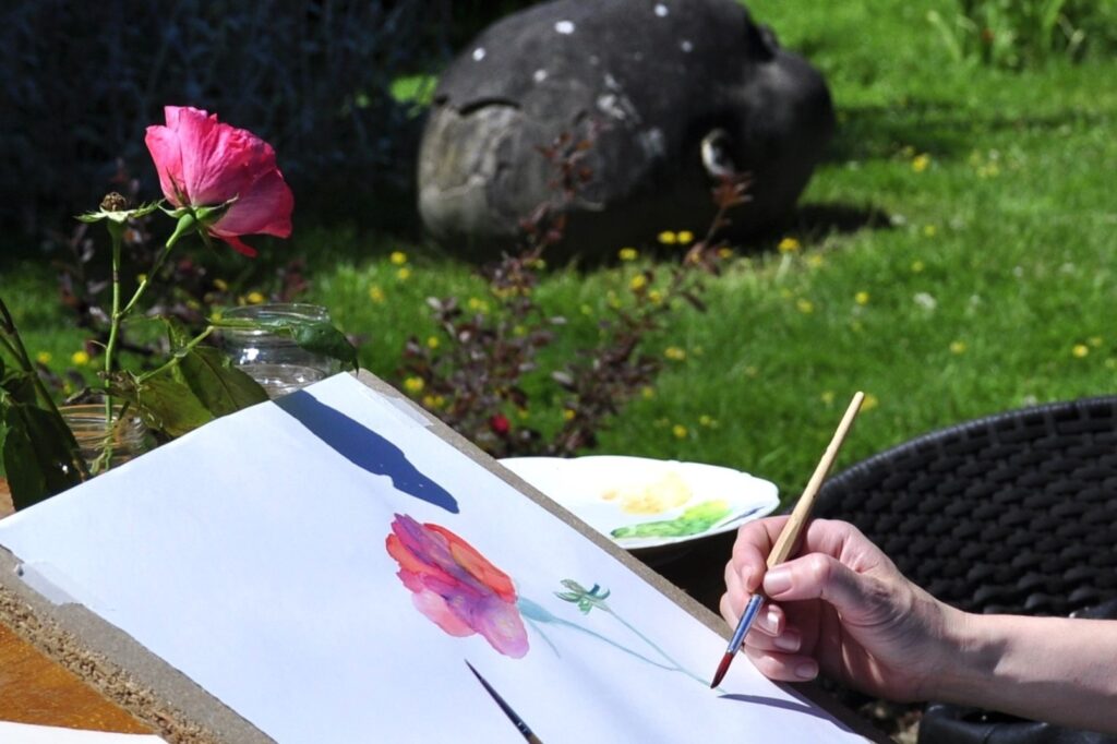Watercolour painting en plein air during art holiday in France